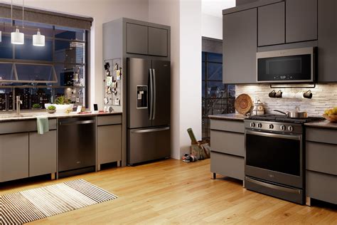 kitchen with black cabinets and stainless steel appliances|kitchen layout black stainless appliances.